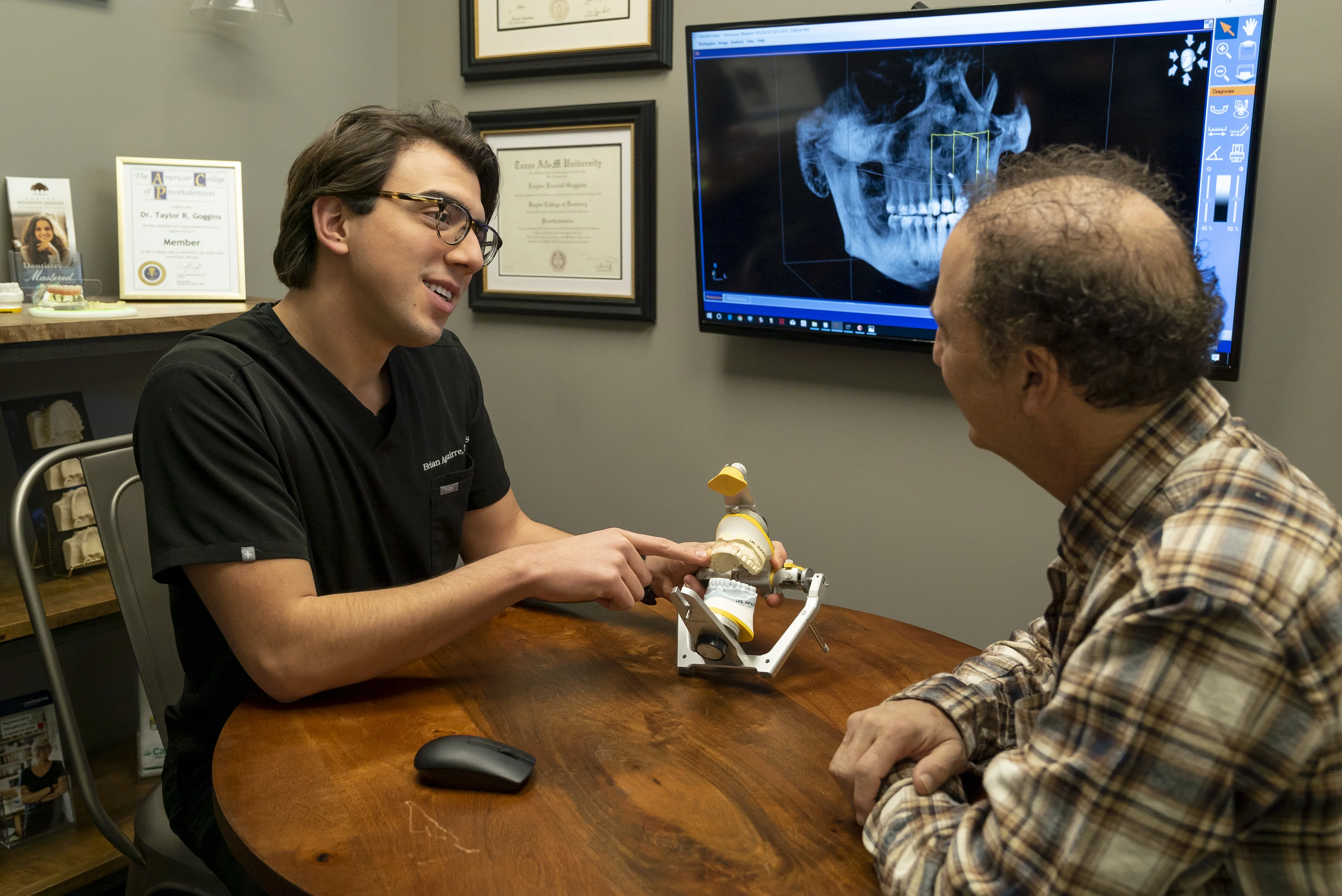 Doctor consulting with patient about dental treatment options